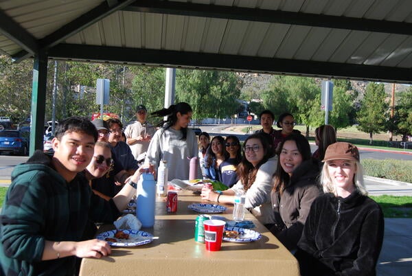 group picture of the lab at the park